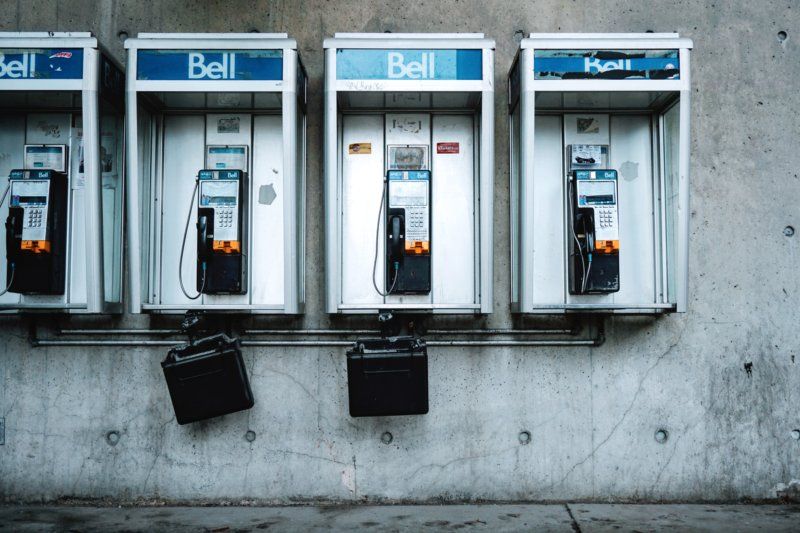 image of a row of pay phones